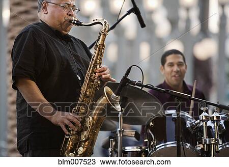 Men playing in jazz band View Large Photo Image Stock Image - Men playing in jazz band. Fotosearch