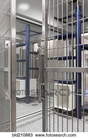 Metal doors of empty cage in animal shelter View Large Photo Image Stock Image - Metal doors of empty cage in animal shelter. Fotosearch