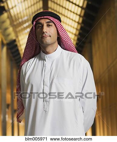 Middle Eastern man in traditional clothing in hallway View Large Photo Image Stock Image - Middle Eastern man in traditional clothing in hallway. Fotosearch