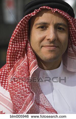 Stock Photograph - Middle Eastern man in traditional clothing. Fotosearch