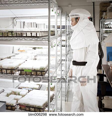 Middle Eastern scientist in clean suit in laboratory View Large Photo Image Stock Photo - Middle Eastern scientist in clean suit in laboratory. Fotosearch