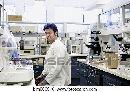 Stock Image - Middle Eastern scientist working in laboratory. Fotosearch