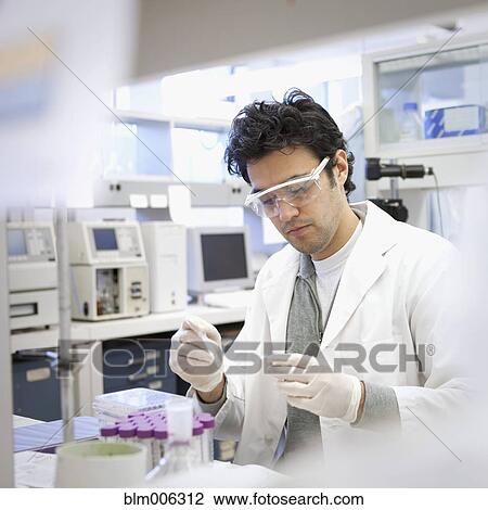 Middle Eastern scientist working in laboratory View Large Photo Image Stock Image - Middle Eastern scientist working in laboratory. Fotosearch