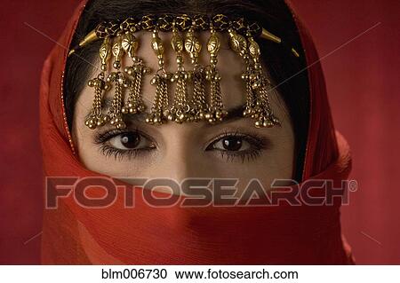 Middle Eastern woman in ornate headdress View Large Photo Image Stock Image - Middle Eastern woman in ornate headdress. Fotosearch