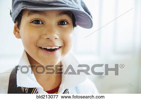 Stock Photo - Mixed race boy smiling. Fotosearch