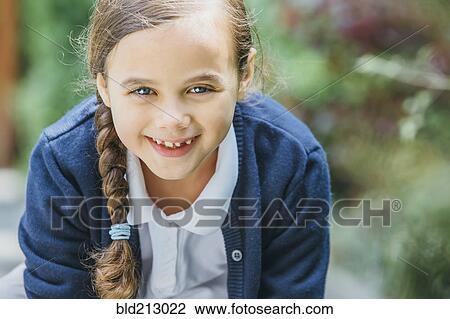 Mixed race girl smiling outdoors View Large Photo Image Stock Image - Mixed race girl smiling outdoors. Fotosearch
