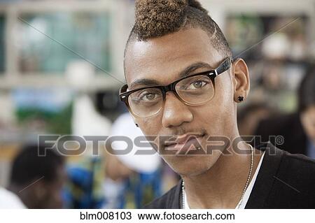 Stock Image - Mixed race high school student in eyeglasses. Fotosearch