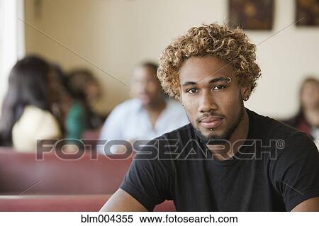 Mixed race man in diner View Large Photo Image Stock Photography - Mixed race man in diner. Fotosearch