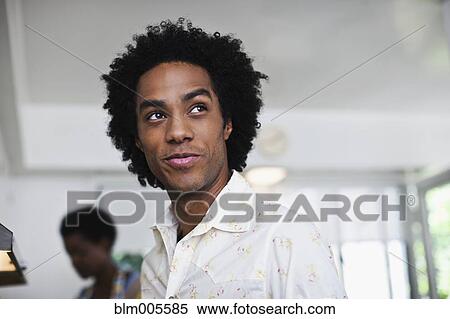 Mixed race man smiling View Large Photo Image Stock Photography - Mixed race man smiling. Fotosearch