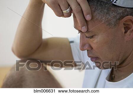 Mixed race man thinking View Large Photo Image Stock Image - Mixed race man thinking. Fotosearch