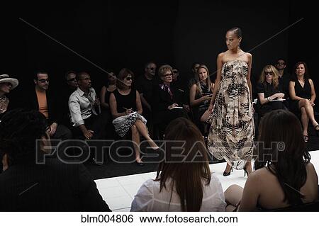 Mixed race model on runway in fashion show View Large Photo Image Stock Photograph - Mixed race model on runway in fashion show. Fotosearch