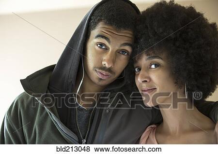 Mixed race mother and son smiling View Large Photo Image Stock Photo - Mixed race mother and son smiling. Fotosearch