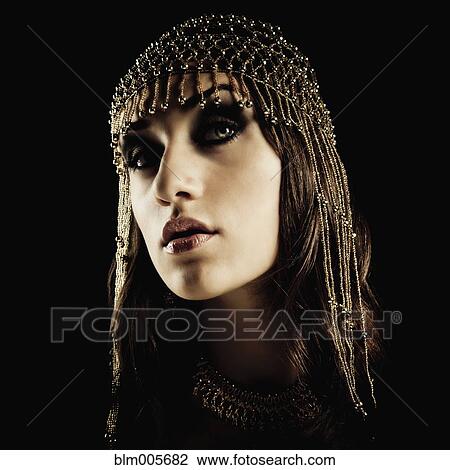 Stock Image - Mixed race woman belly dancer. Fotosearch