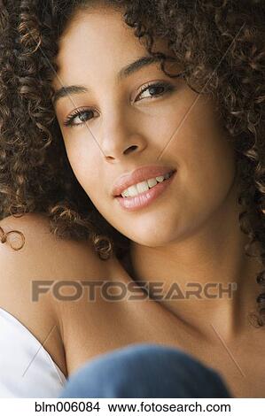 Mixed race woman smiling View Large Photo Image Picture - Mixed race woman smiling. Fotosearch