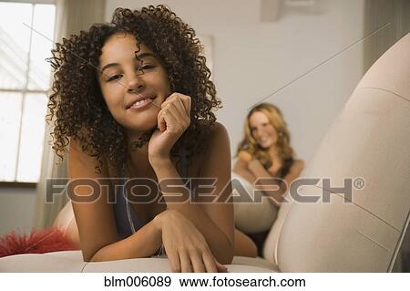 Stock Photo - Mixed race woman smiling. Fotosearch