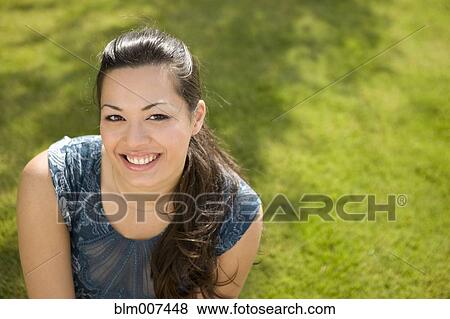 Stock Photo - Mixed race woman smiling. Fotosearch