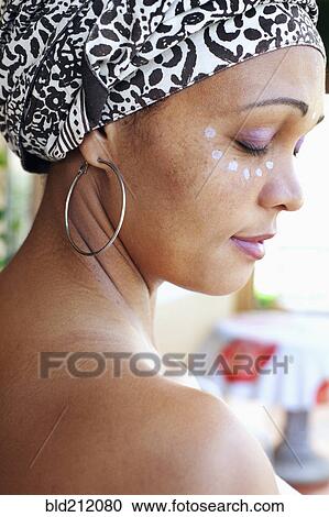 Mixed race woman wearing turban and make up View Large Photo Image Stock Image - Mixed race woman wearing turban and make up. Fotosearch