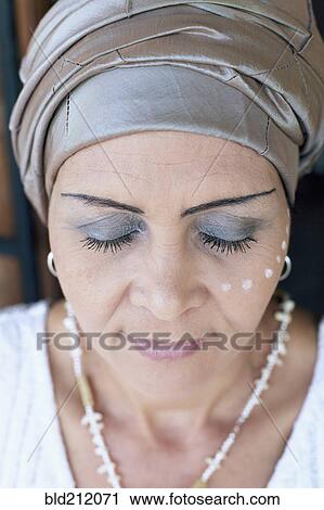 Mixed race woman wearing turban View Large Photo Image Stock Image - Mixed race woman wearing turban. Fotosearch