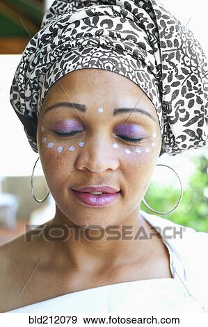 Stock Photo - Mixed race woman wearing turban. Fotosearch