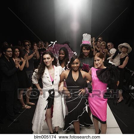 Picture - Models on runway in fashion show. Fotosearch