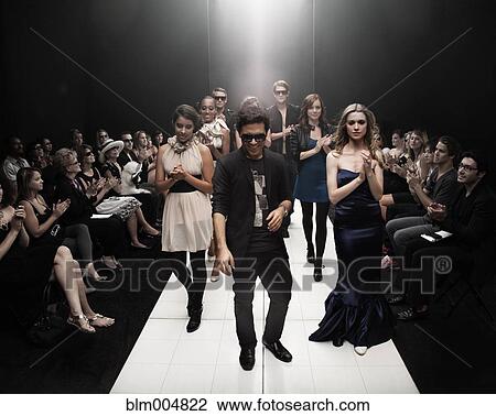 Models on runway in fashion show View Large Photo Image Stock Image - Models on runway in fashion show. Fotosearch