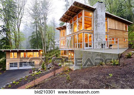 Stock Image - Modern house in woods. Fotosearch