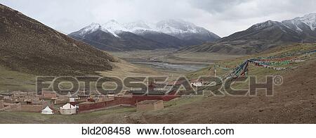 Stock Photo - Monastery buildings in mountain valley near Manchen Lhagong. Fotosearch