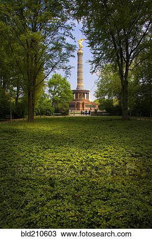 Stock Image - Monument overlooking urban park, Berlin, Germany. Fotosearch