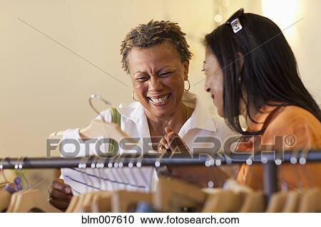 Mother and daughter shopping together View Large Photo Image Stock Image - Mother and daughter shopping together. Fotosearch