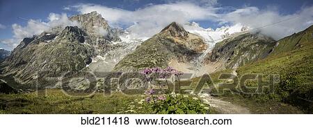 Stock Photo - Mt Blanc trail in mountains, Val Ferret, Switzerland. Fotosearch