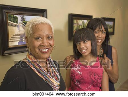 Multi-generation family in gallery View Large Photo Image Picture - Multi-generation family in gallery. Fotosearch