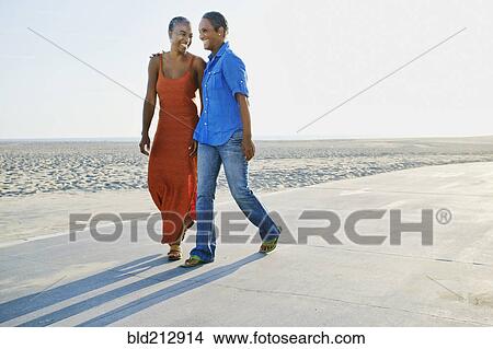 Older Black women walking by beach View Large Photo Image Picture - Older Black women walking by beach. Fotosearch