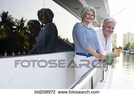 Older Caucasian couple having coffee on boat deck View Large Photo Image Stock Image - Older Caucasian couple having coffee on boat deck. Fotosearch