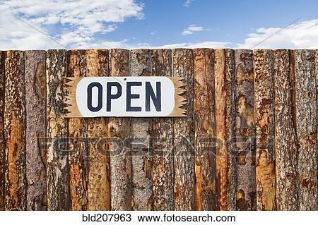 Stock Image - Open sign on wooden fence. Fotosearch