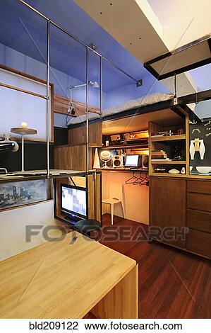 Organized space of compact studio apartment View Large Photo Image Stock Image - Organized space of compact studio apartment. Fotosearch