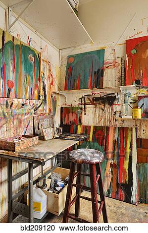 Stock Image - Paint splattered walls of art studio. Fotosearch