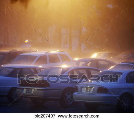 Stock Photo - Parked Cars in a Rainstorm. Fotosearch