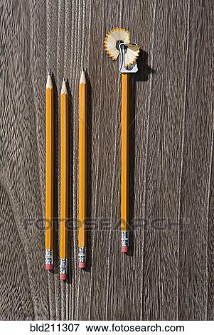 Pencils and sharpener with shavings View Large Photo Image Stock Photo - Pencils and sharpener with shavings. Fotosearch