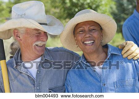 Stock Image - People doing yardwork. Fotosearch