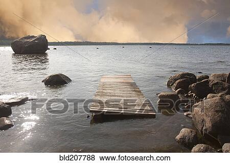 Pier Floating on a Rocky Shore View Large Photo Image Stock Photo - Pier Floating on a Rocky Shore. Fotosearch