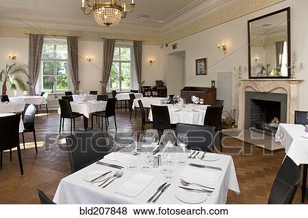Place settings on tables in luxury restaurant View Large Photo Image Stock Photo - Place settings on tables in luxury restaurant. Fotosearch