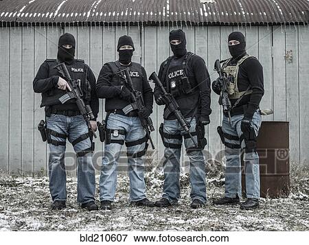 Stock Photo - Police snipers standing together outdoors. Fotosearch