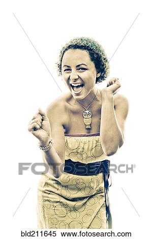 Stock Photography - Portrait of enthusiastic woman wearing owl necklace. Fotosearch