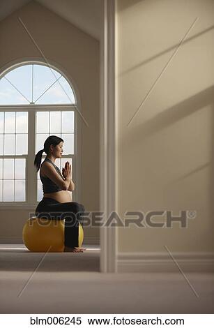Pregnant Chinese woman sitting in exercise ball View Large Photo Image Stock Photography - Pregnant Chinese woman sitting in exercise ball. Fotosearch
