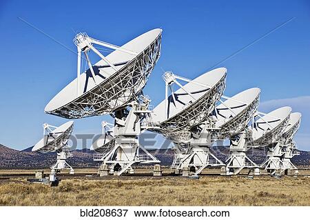 Stock Photo - Radio telescopes in the landscape in New Mexico. Fotosearch