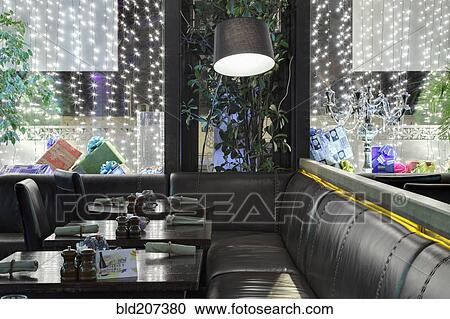 Restaurant windows decorated with gift boxes and illumination View Large Photo Image Stock Image - Restaurant windows decorated with gift boxes and illumination. Fotosearch