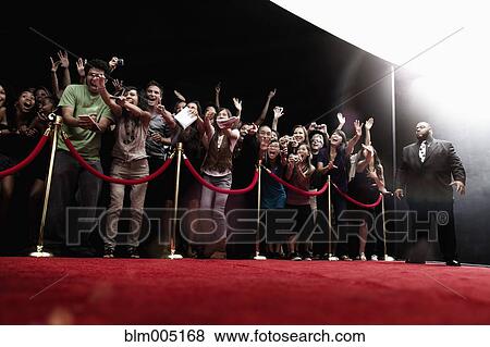 Screaming fans on the red carpet View Large Photo Image Stock Photo - Screaming fans on the red carpet. Fotosearch