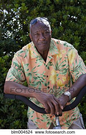 Senior African man on bicycle View Large Photo Image Picture - Senior African man on bicycle. Fotosearch