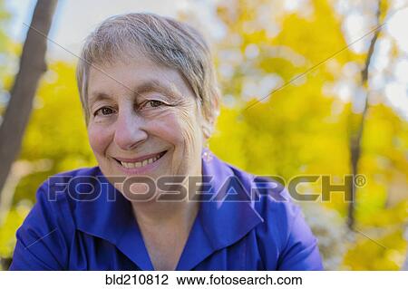 Senior Caucasian smiling outdoors View Large Photo Image Stock Image - Senior Caucasian smiling outdoors. Fotosearch