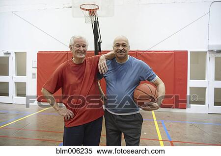 Senior men playing basketball View Large Photo Image Stock Photography - Senior men playing basketball. Fotosearch